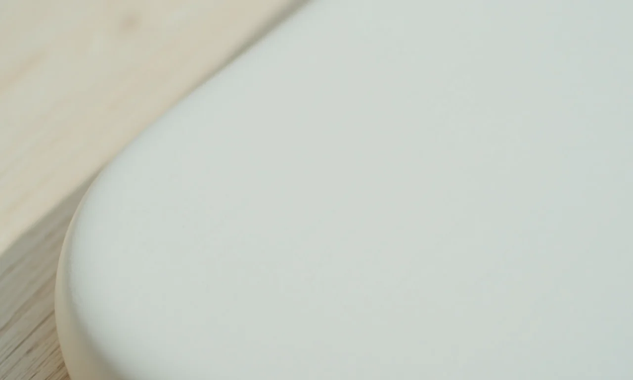 Superfície lisa e acolchoada de tábua de passar.